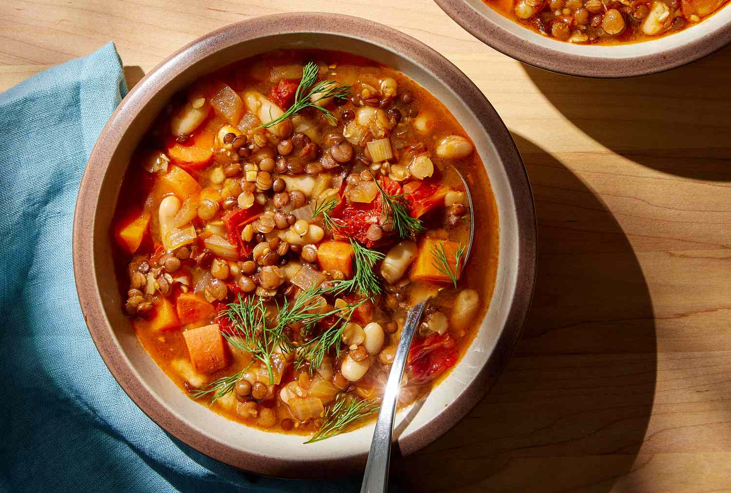 A brown bowl with the vegan lentil soup recipe