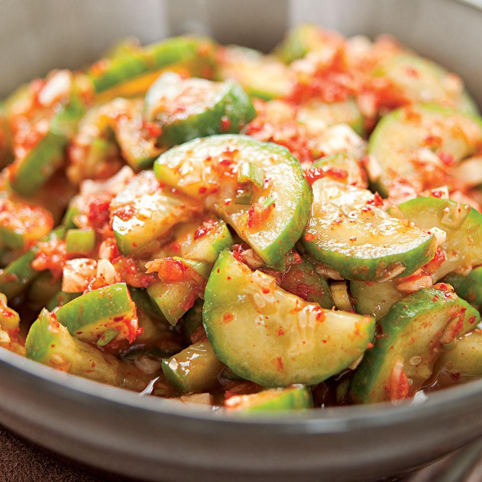 close-up shot of bowl of cucumber kimchi