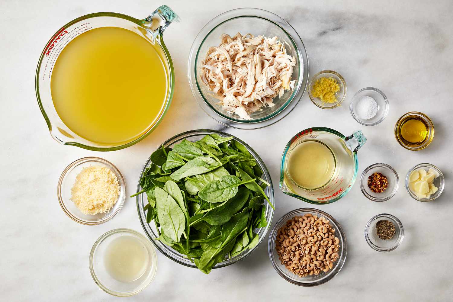 a photo of the ingredients to make the Spinach & Chicken Noodle Soup with Lemon & Parmesan
