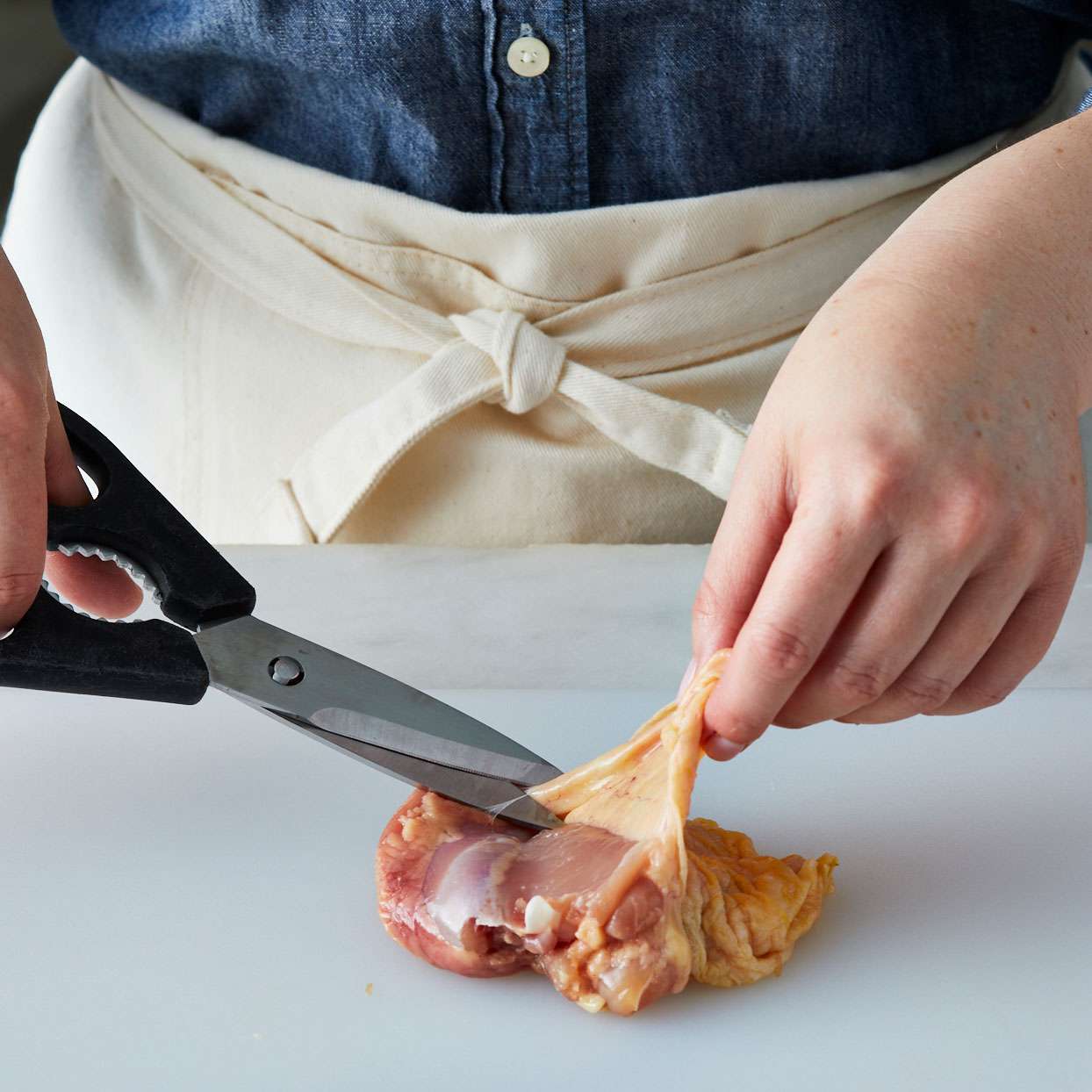 Removing-skin-from-chicken-thigh