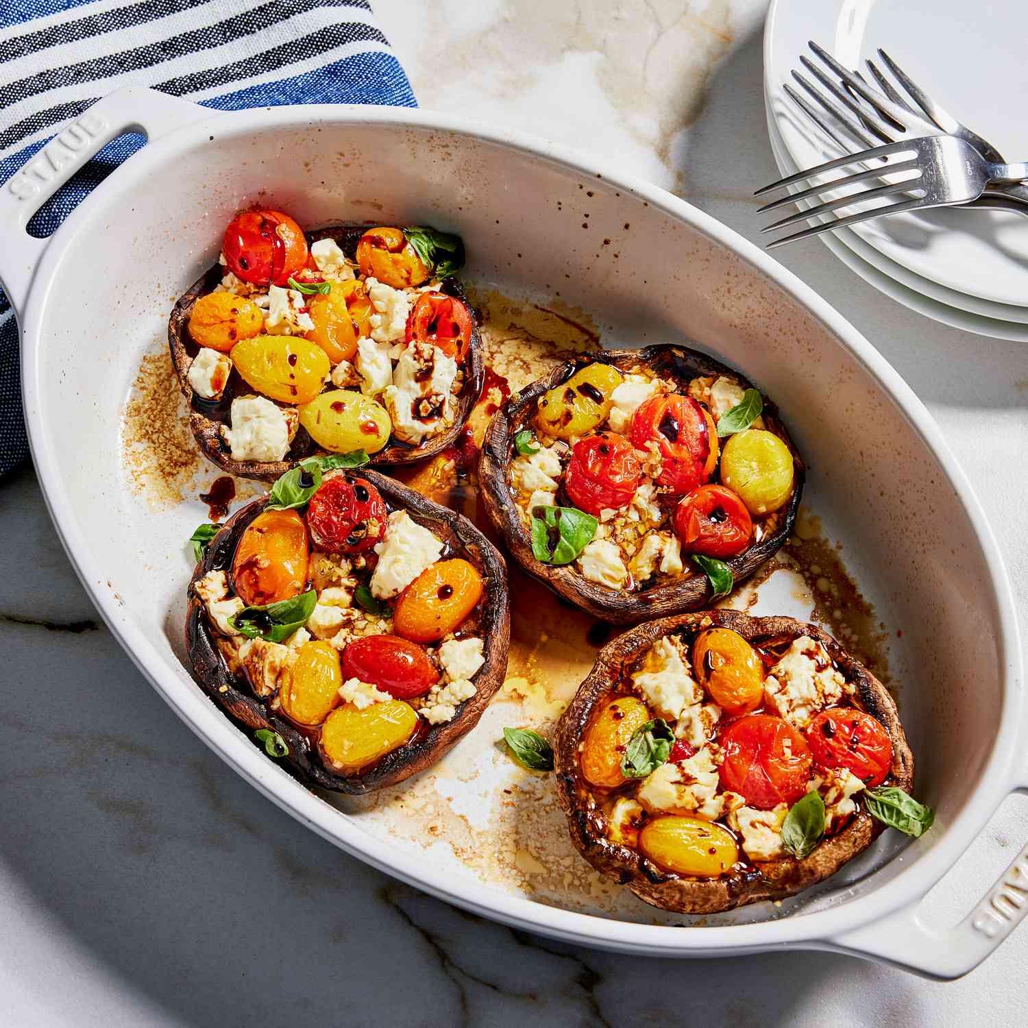 a recipe photo of the Baked Feta & Tomato Portobellos