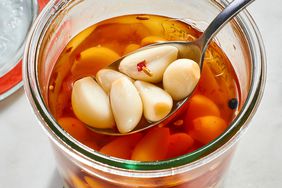 a recipe photo of the Pickled Garlic Cloves in a jar