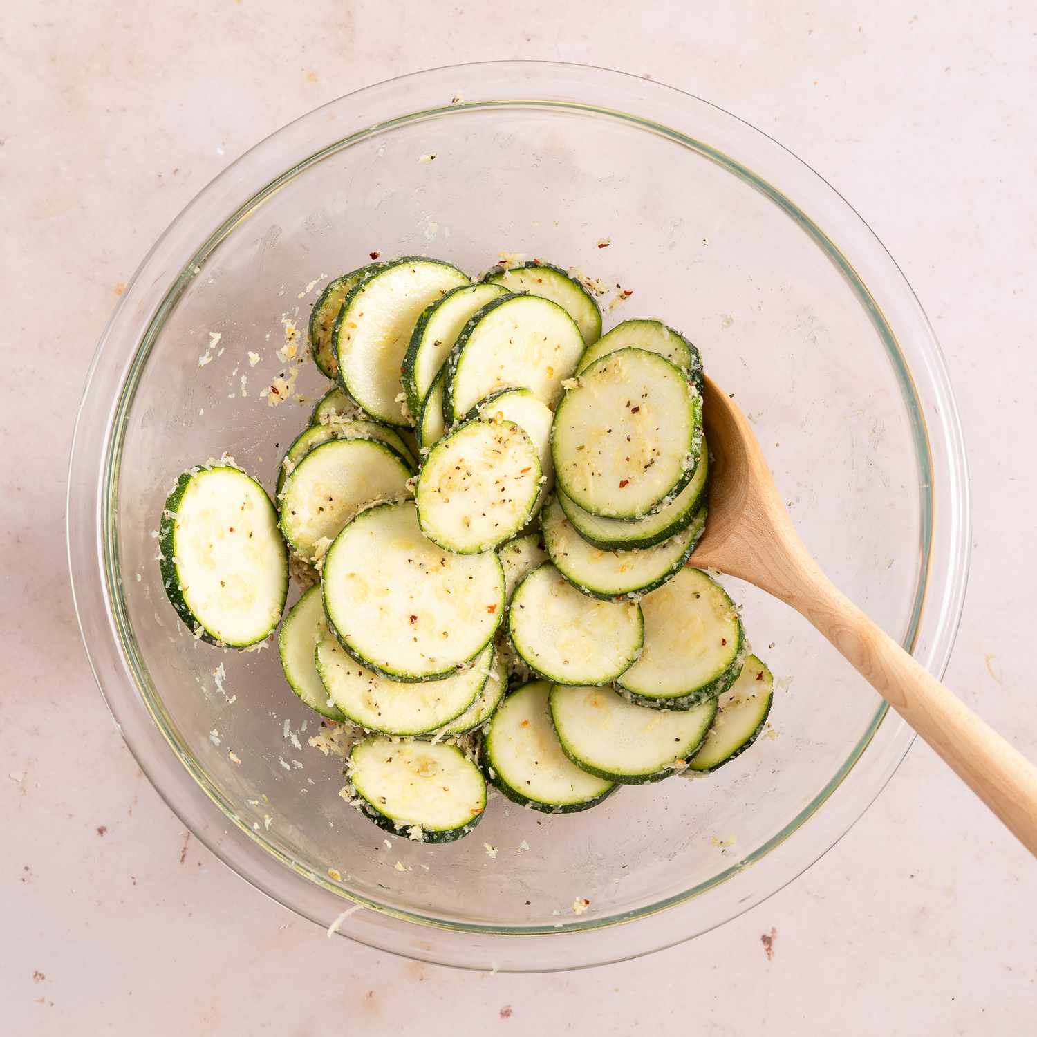 bowl with zucchini slices with seasonings