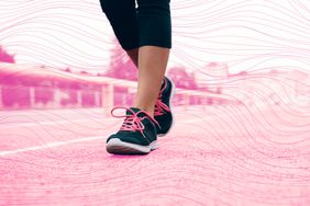 Close-up of someone walking wearing athletic shoes on a pathway, focusing on feet and lower legs