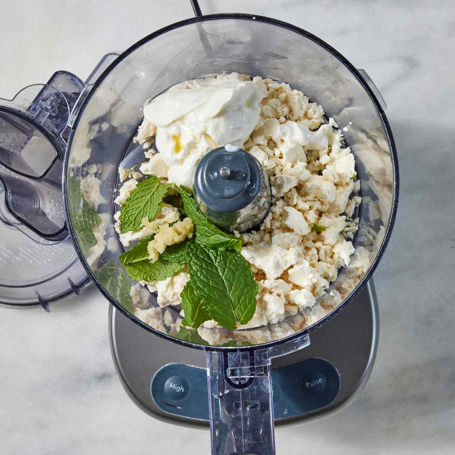 a step to make the Whole Roasted Cauliflower with Whipped Feta & Pomegranate