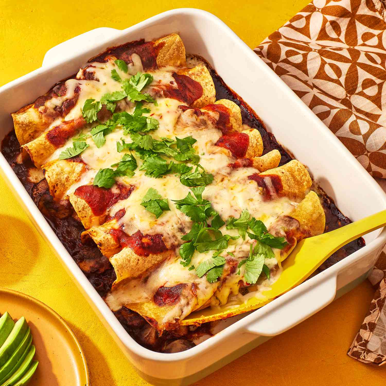 a recipe photo of the Mushroom Black Bean Enchiladas in a casserole dish