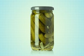 a photo of pickles in a jar