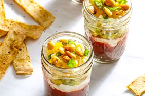 Individual Seven Layer Dip in Jars with Baked Tortilla Chips