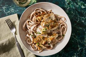 Creamy chicken fettuccine Alfredo in a white bowl