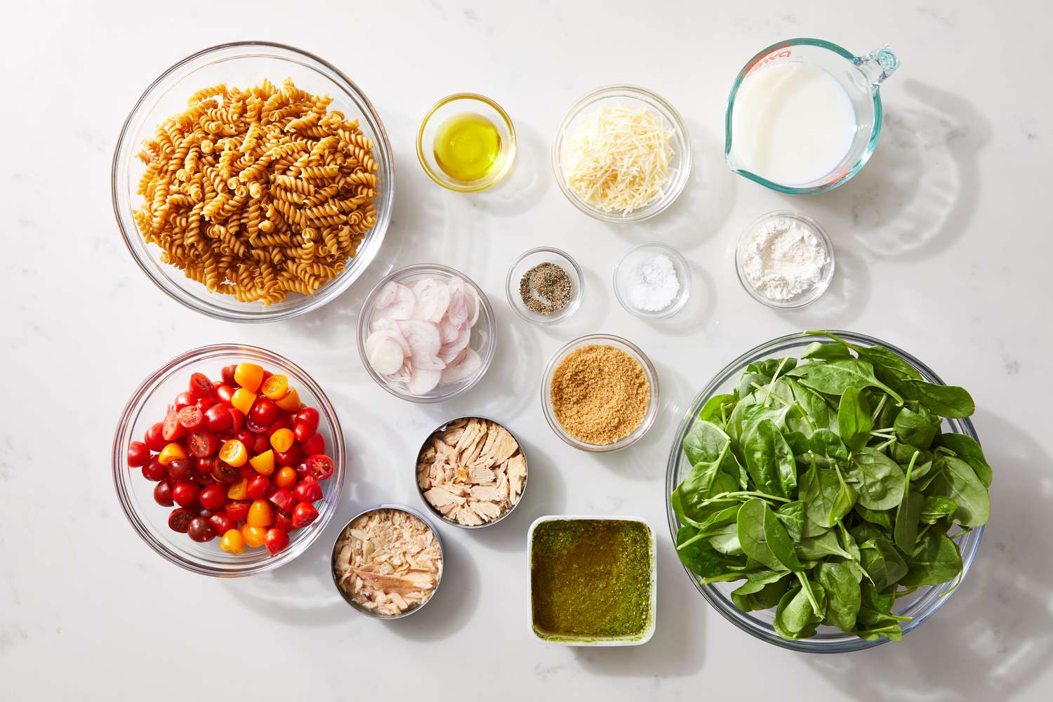 the ingredients to make the Pesto Tuna Noodle Casserole