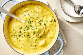 Vegetarian No-Chicken and Dumplings recipe in a pot with serving spoon