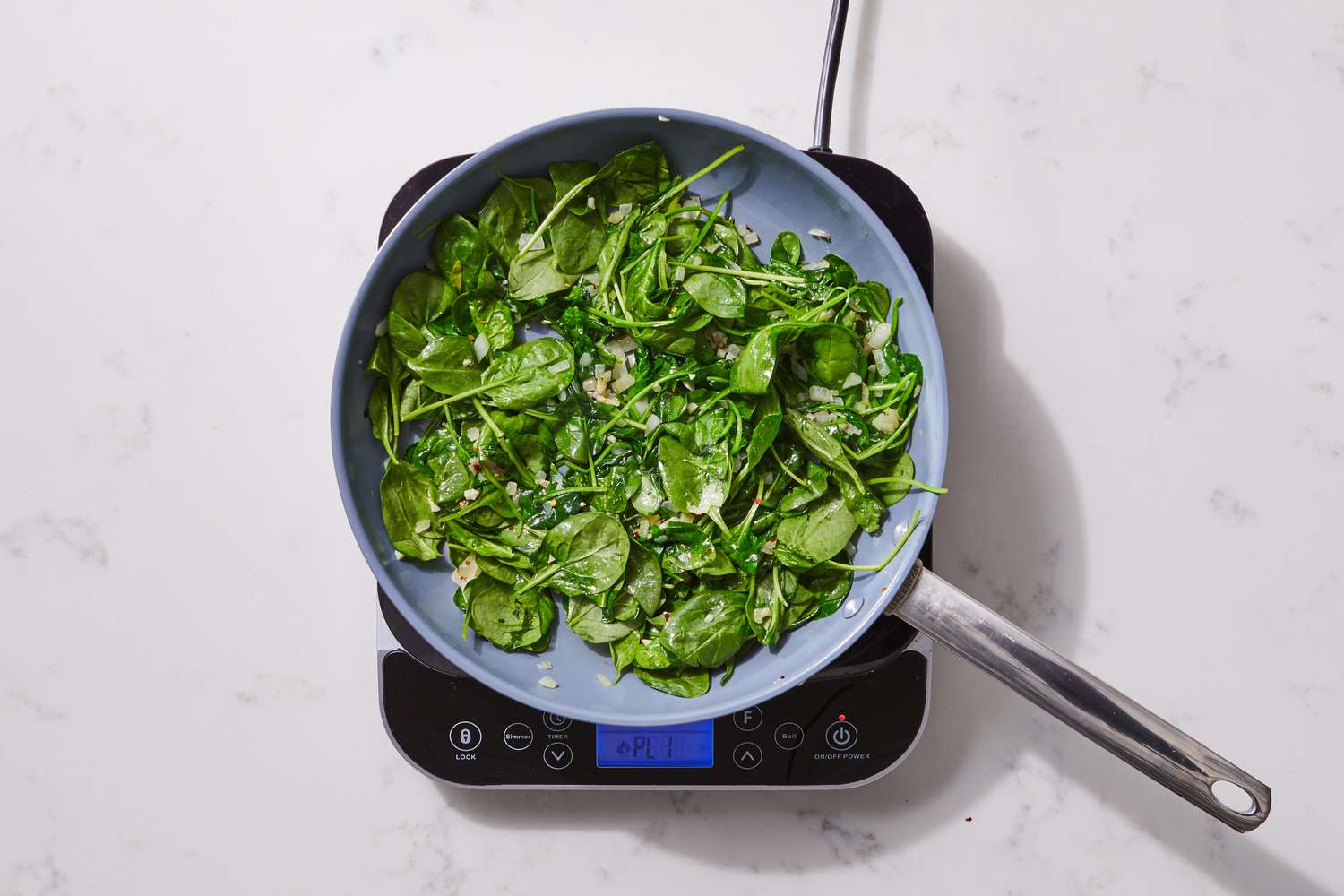 a step in making the Spinach & Tortellini Casserole