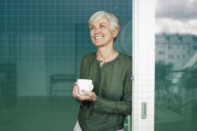 older woman drinking coffee