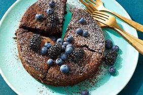 a recipe photo of the Air-Fryer Mini Dark Chocolate Cake served on a platter with forks