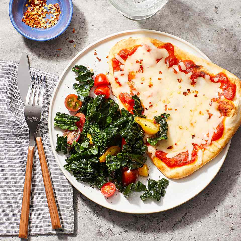 naan pizza on plate