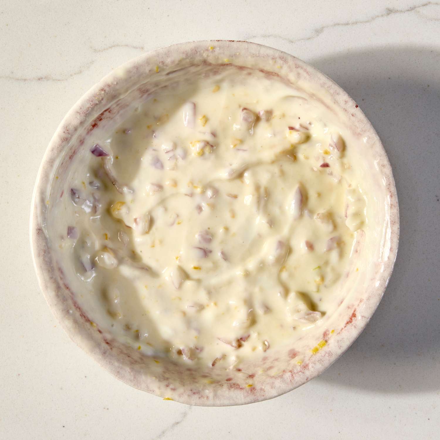 an image of the yogurt, lemon, shallot mixture