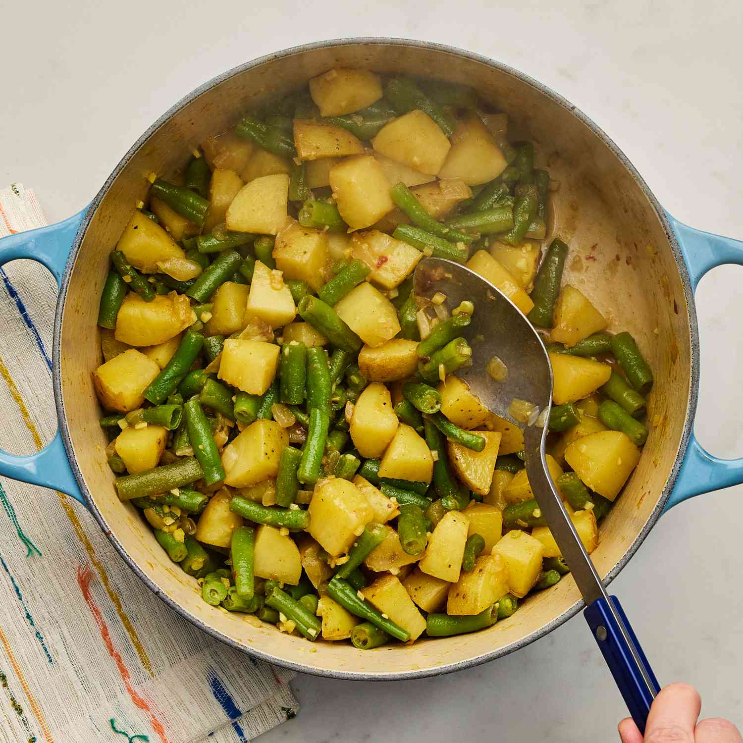 a step in making the Potato Curry