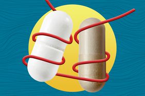 Two capsules connected by a red cord