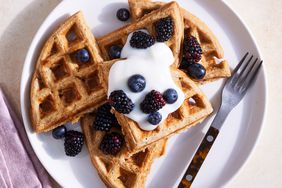 overhead view of Oatmeal Waffles with yogurt and berry topping on a plate