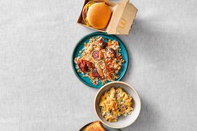 6 dinner plates on grey background