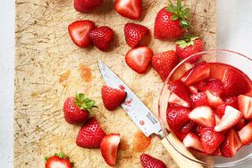 strawberries on cutting board
