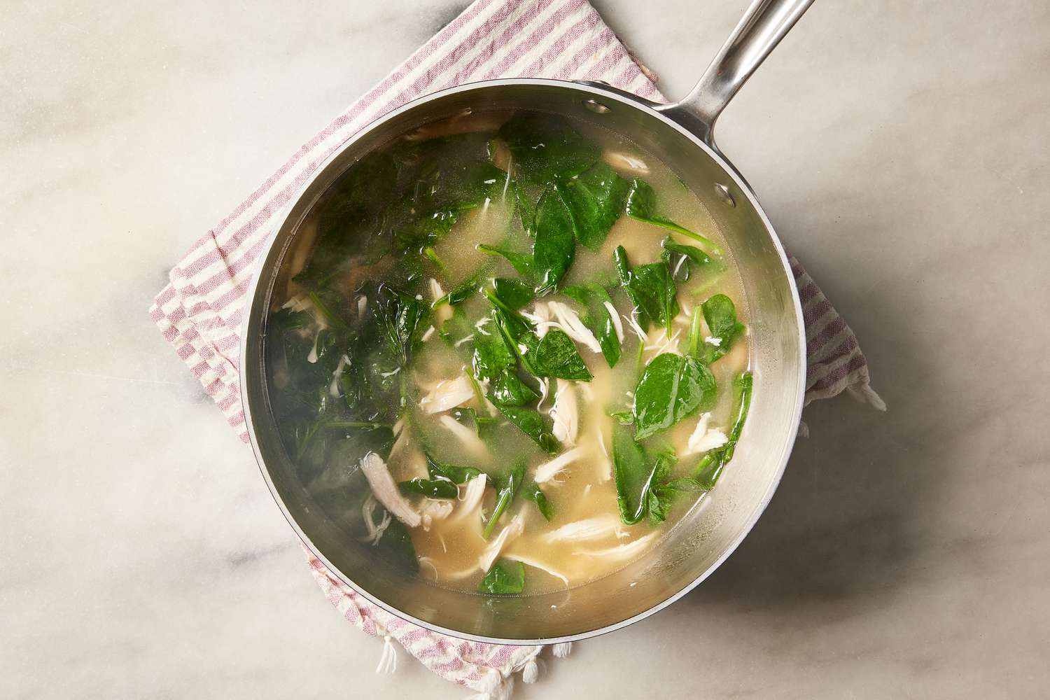a step in making the Spinach & Chicken Noodle Soup with Lemon & Parmesan
